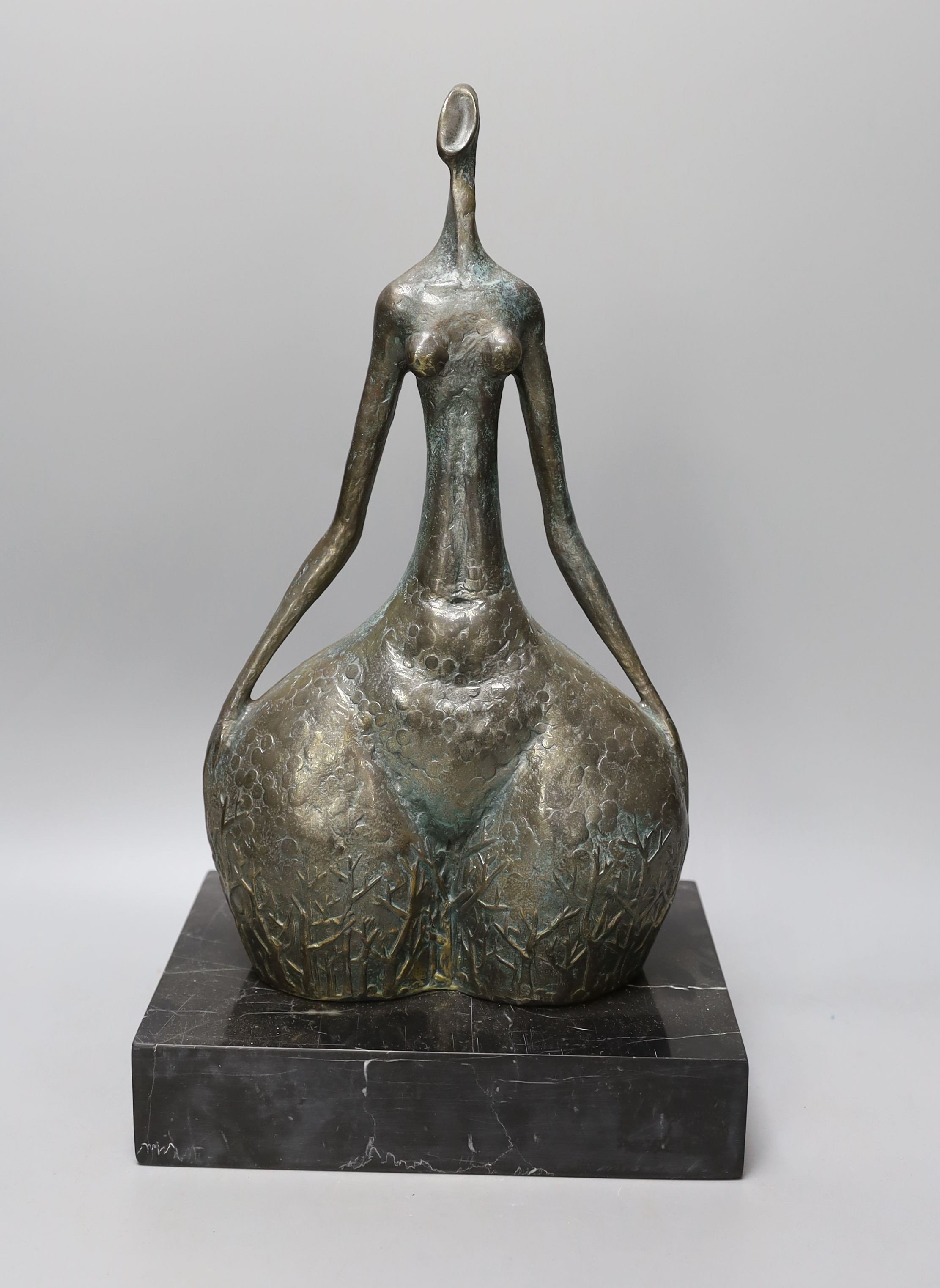 A 20th century bronze study of a stylised nude female - 40cm tall